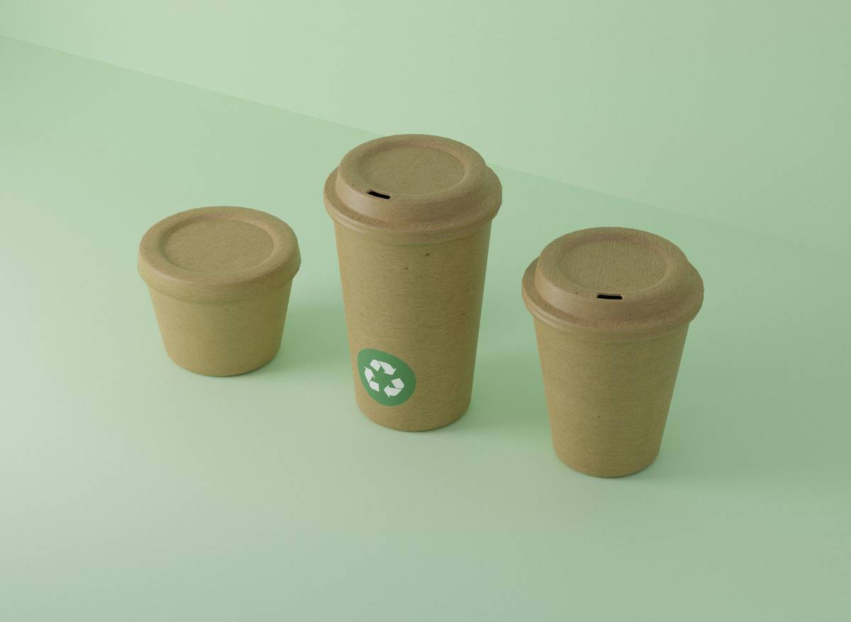 Infographic comparing lifetime environmental impact of disposable cups vs. stainless steel mugs showing CO2 emissions, water use, and landfill waste